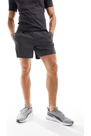 PUMA Training Evolve woven short in dark