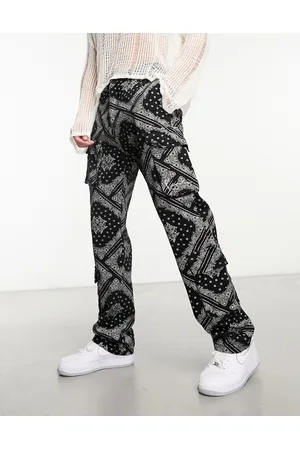 Karl Kani Small signature cargo trousers in with all over paisley print
