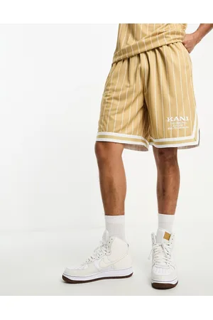 Karl Kani Retro co-ord pinstripe jersey shorts in beige and white