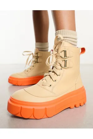 sorel Caribou lace up boots in camel