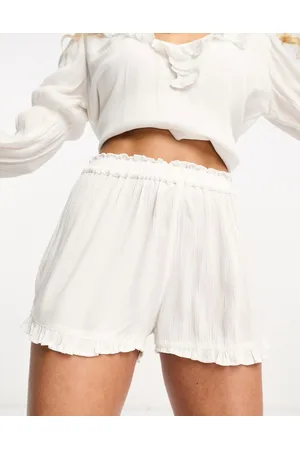 Iisla & Bird Ruffle beach short co-ord in
