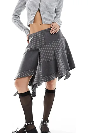 Reclaimed Limited edition spliced pinstripe skirt with raw hem