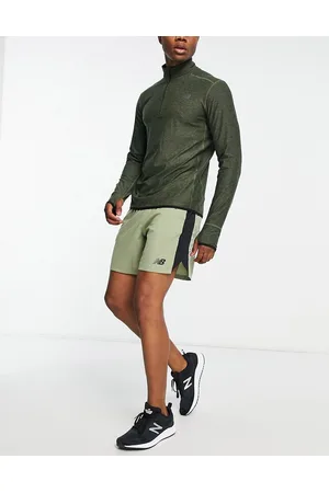 New Balance Tenacity 7 inch shorts in olive