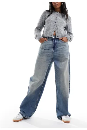 Bershka High waisted super baggy jeans in mid dirty wash