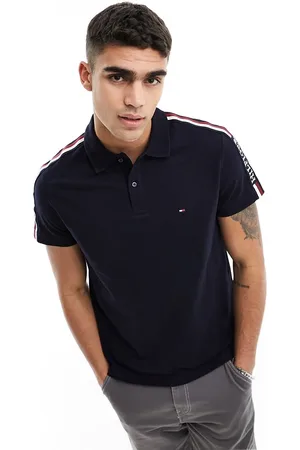Tommy Hilfiger Global stripe monotype regular polo shirt in Navy