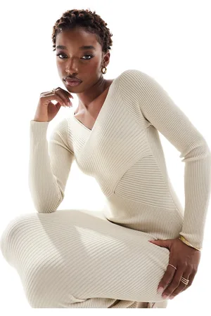 In The Style Cross front detail knitted midi jumper dress in cream