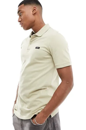 Calvin Klein Stretch pique slim button polo shirt in cream
