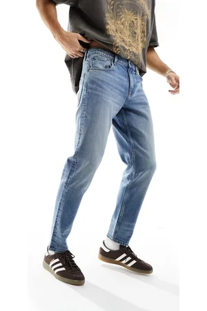 ASOS Stretch tapered jeans in mid wash