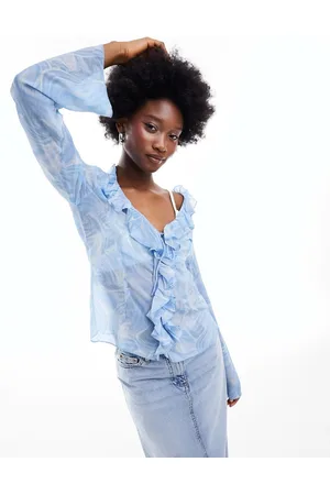 Monki Front ruffle blouse in blue swirl print
