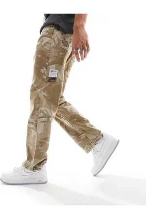 A Bathing Ape Aape By A Bathing Ape camo jeans in beige