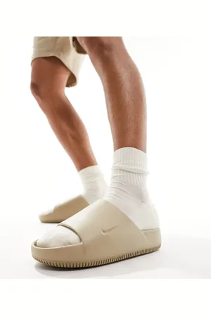Nike Calm Sliders in khaki