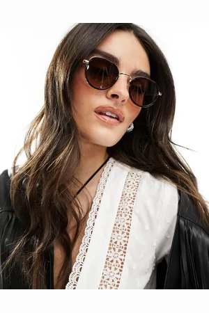 Aire Cygnus round sunglasses in /gold