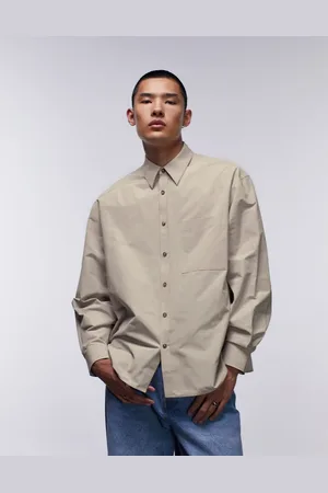 Topman Limited long sleeve oversized fit pointed collar shirt in beige