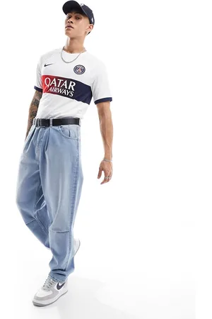 ASOS Tapered fit jeans in mid wash