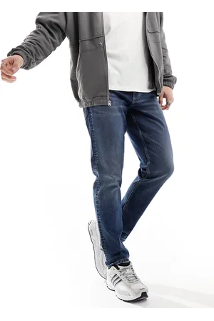ASOS Stretch tapered jeans in mid wash
