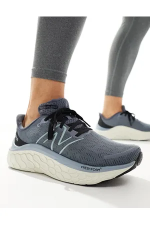 New Balance Kaiha running trainers in dark