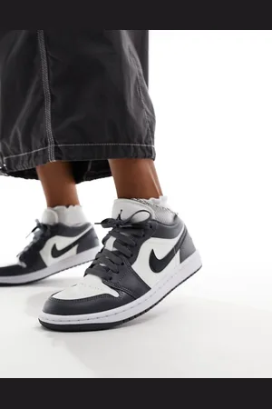 Jordan Air 1 low trainers in off and dark grey