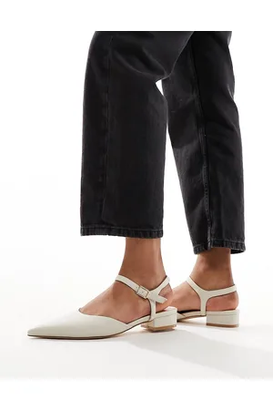 Truffle Collection Pointed heeled mules in beige