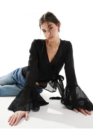 Monki Tie waist wrap blouse with fluted cuffs in