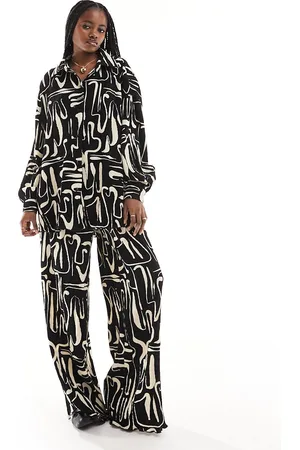 Extro & Vert Plisse trousers in abstract print co-ord