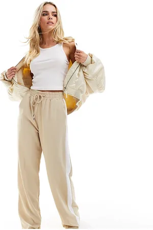 River Island Wide leg jogger trouser with side stripe in beige