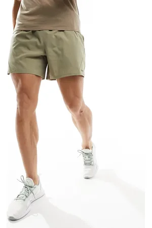 PUMA Training Evolve woven short in beige -