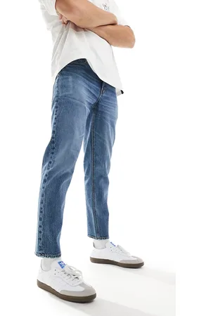 ASOS Stretch tapered jeans in mid wash