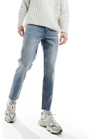ASOS Stretch tapered jeans in mid wash