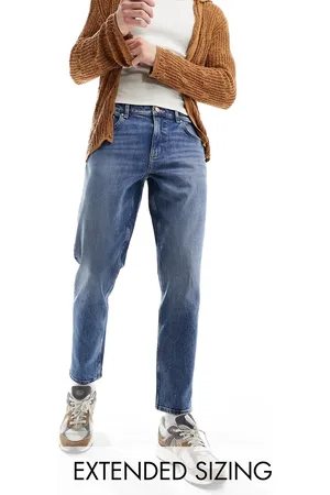 ASOS Stretch tapered jeans in mid wash