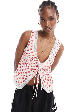 Glamorous Corset detail tie front top with lace trim in red daisy print