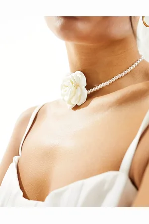 True Decadence Pearl choker with rose corsage in
