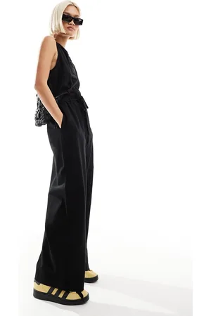 Monki Linen sleeveless jumpsuit with tie belt detail in