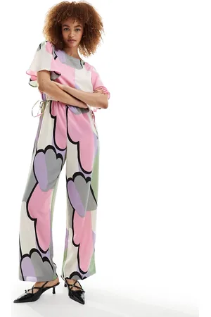 Monki Jumpsuit with tie waist detail in cloud print