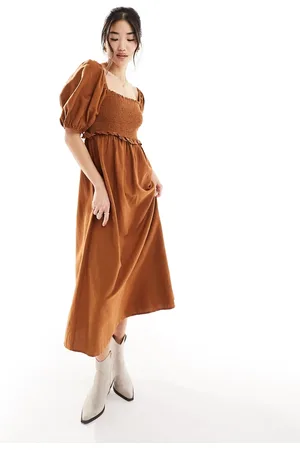 New Look Shirred waist puff sleeve midi dress in rust