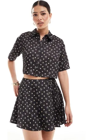 ASOS Satin wrap co-ord mini skirt in bow print
