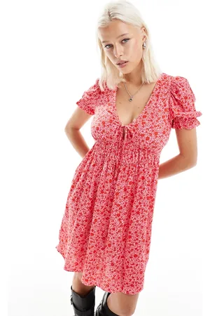 Monki Mini smock dress with puff sleeves in ditsy floral print