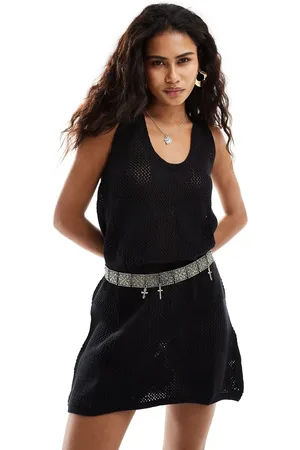 Monki Sleeveless knitted mini dress in