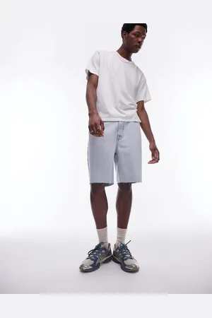 Topman Wide leg raw hem denim short in bleach wash