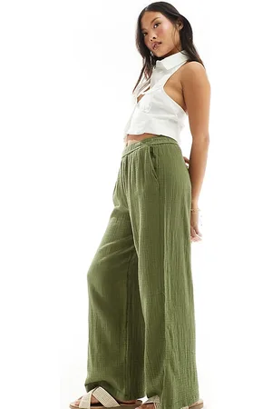 Stradivarius Petite crinkle pull on trouser in khaki