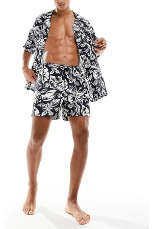 Tommy Hilfiger Co-ord Essential medium drawstring swim short in vintage tropical print