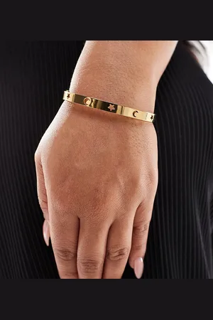 ASOS ASOS DESIGN Curve waterproof stainless steel bangle with celestial design