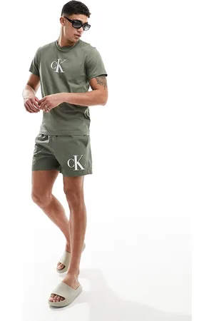 Calvin Klein Monogram medium drawstring swim short in olive
