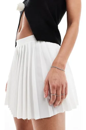 Bershka Raw edge pleated mini tennis skirt in