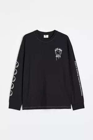 H&M Relaxed Fit Genser i trikot med trykk - Sort