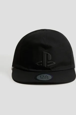 H&M Caps med preget trykk