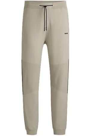 HUGO BOSS Regular-fit knitted tracksuit bottoms with stripes and branding