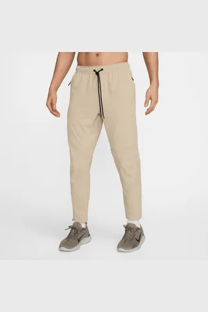 Nike Unlimited Dri-FIT allsidig bukse med glidelås ved ankelen til herre
