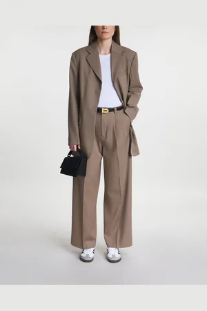 Teurn Studios Relaxed-fit pleated trousers 34